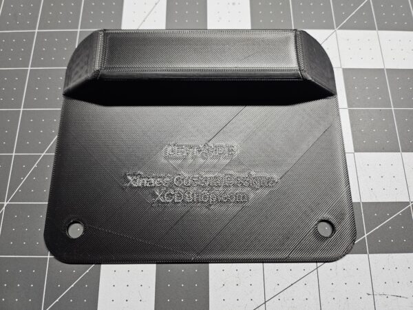 Closeup of a left-side unit license plate tool holder (LPTH)